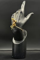 كف تايجر ذهب مع صدف اخضر عيار 18 وزن 10.3 جرام