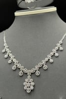 طقم ذهب أبيض للعروس عيار 18 سموّ الألماس وزن 24.5...