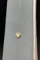 اسوارة وردة ذهب صافي عيار 18 وزن 0.4 جرام