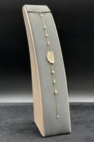 اسوارة شناف ذهب مع لؤلؤ عيار 18 وزن 2.15 جرام