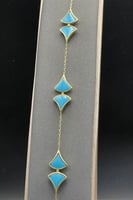 اسوارة معينات ذهب مع صدف فيروزي عيار 18 وزن 7.7 جر...