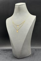 عقد دورين مجدول مع وردة ذهب صافي عيار 21 وزن من 0....