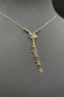 عقد نجمة مع نجمات نازله ذهب صافي ايطالي