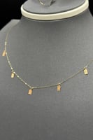 طقم مستطيل ذهب صافي عيار 21 وزن من 1.4 الى 1.5 جرا...