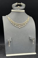 طقم ذهب مع باقيت تصميم الماس عيار 18 وزن 14.4 جرام