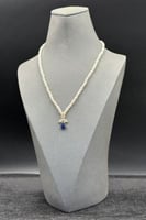 عقد ذهب مع لؤلؤ مع فص ازرق عيار 18 وزن 1.3 جرام