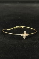 اسوارة اطفال زهرة ذهب تصميم الماس عيار 18 وزن 0.8...