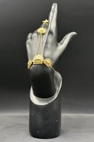 كف براشي ذهب بحريني مع صدف ابيض عيار 21 وزن من 6.5...