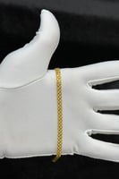 اسوارة ذهب صافي عيار 21 وزن من 2.4 الى 2.5 جرام