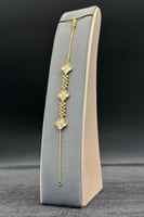 اسوارة ثلاث وردات ذهب صافي عيار 21 وزن من 5.5 الى...