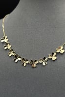 طقم وردات ذهب صافي عيار 18 وزن 8.5 جرام