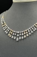 طقم ذهب ابيض مع اصفر تصميم الماس عيار 18 وزن 13.1...