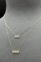 عقد دورين مستطيل ذهب تصميم الماس عيار 18 وزن من 0....