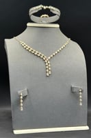 طقم دمعات ذهب تصميم الماس عيار 18 وزن 11 جرام