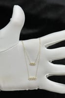 عقد دورين مستطيل ذهب تصميم الماس عيار 18 وزن من 0....