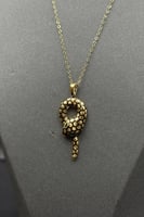 عقد شكل ثعبان ذهب تصميم الماس عيار 18 وزن 2.7 جرام