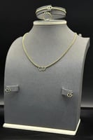 طقم ذهب صافي عيار 18 وزن 7.5 جرام