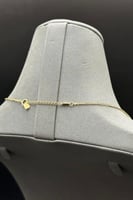 عقد اوراق مع كور ذهب صافي عيار 18 وزن 4.6 جرام