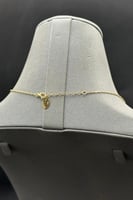 عقد ذهب مع صدف فيروزي عيار 18 وزن من 7.4 الى 7.5 ج...