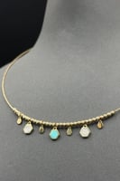 عقد مع اسوارة شكل خلية ذهب ايطالي عيار 18 وزن 15.9...