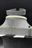 نصف طقم ذهب اشناف مع لؤلؤ عيار 18 وزن 6.7 جرام