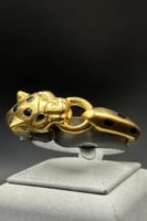 اسوارة مع خاتم تايجر ذهب مع صدف اخضر عيار 18 وزن 2...