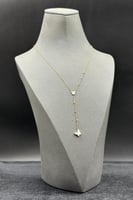 عقد فراشة نازل مع صدف ابيض عيار 18 وزن 2.1 الى 2.2...