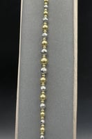 عقد و اسوارة كور ذهب صافي عيار 18 وزن 9.5 جرام