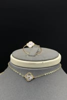 طقم وردات ذهب صافي ملون عيار 18 وزن 3.3 جرام