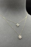 عقد دورين زهرة ذهب تصميم الماس عيار 18 وزن من 1 ال...