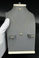 طقم اطفال قلب ذهب صافي عيار 18 وزن من 3.9 الى 4 جر...