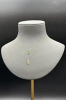 عقد دورين مستطيل ذهب تصميم الماس عيار 18 وزن من 0....