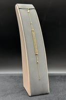 اسوارة شوطين مجدول ذهب صافي عيار 18 وزن من 1.3 الى...