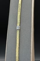 اسوارة سهم ذهب مع باقيت تصميم الماس عيار 18 وزن 9....