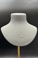 عقد دورين مستطيل ذهب تصميم الماس عيار 18 وزن من 0....