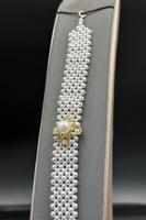 اسوارة لؤلؤ مع ذهب شكل وردة عيار 18 وزن 1.8 جرام