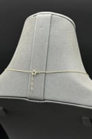 عقد وردتين ذهب مع صدف ملون عيار 18 وزن من 1.2 الى...