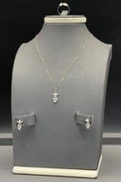 طقم وردة مع باقيت ذهب تصميم الماس عيار 18 وزن 1.6...