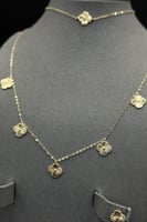 طقم اطفال وردات ذهب صافي عيار 18 وزن 3.4 جرام