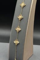 اسوارة خمس وردات ذهب تصميم الماس