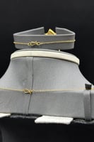 طقم ذهب ناعم عيار 21 نغمة الهدوء وزن من 4.9 إلى 5...