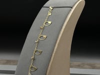 خلخال دوائر مع وردة ذهب صافي