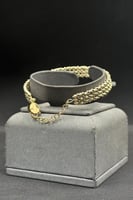 اسوارة مع خاتم كور ذهب صافي عيار 18 وزن 19.9 جرام