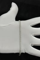 اسوارة شوطين تنس ذهب ابيض تصميم الماس عيار 18 وزن...