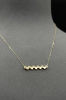 عقد ذهب شكل خلية تصميم الماس عيار 18 وزن من 1 الى...