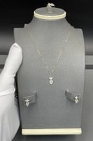 طقم وردة مع باقيت ذهب تصميم الماس عيار 18 وزن 1.6...