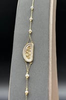 اسوارة شناف ذهب مع لؤلؤ عيار 18 وزن 2.15 جرام