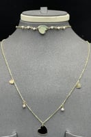 طقم اطفال قلب ذهب مع لؤلؤ عيار 18 وزن 4.4 جرام