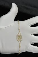 اسوارة شناف ذهب مع لؤلؤ عيار 18 وزن 2.2 جرام