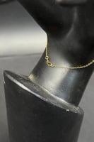 كف شكل سبيكة بيضاوي ذهب صافي عيار 21 وزن 2.3 جرام